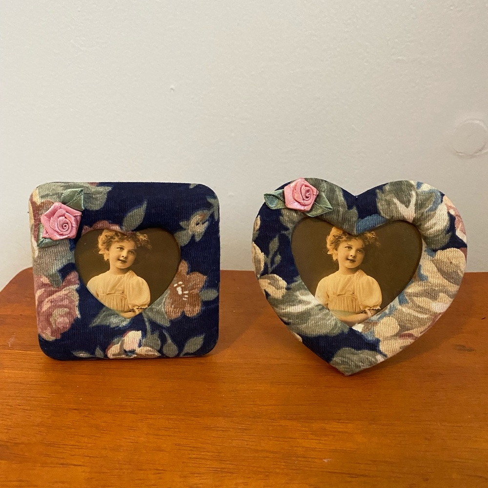 Two small fabric covered picture frames